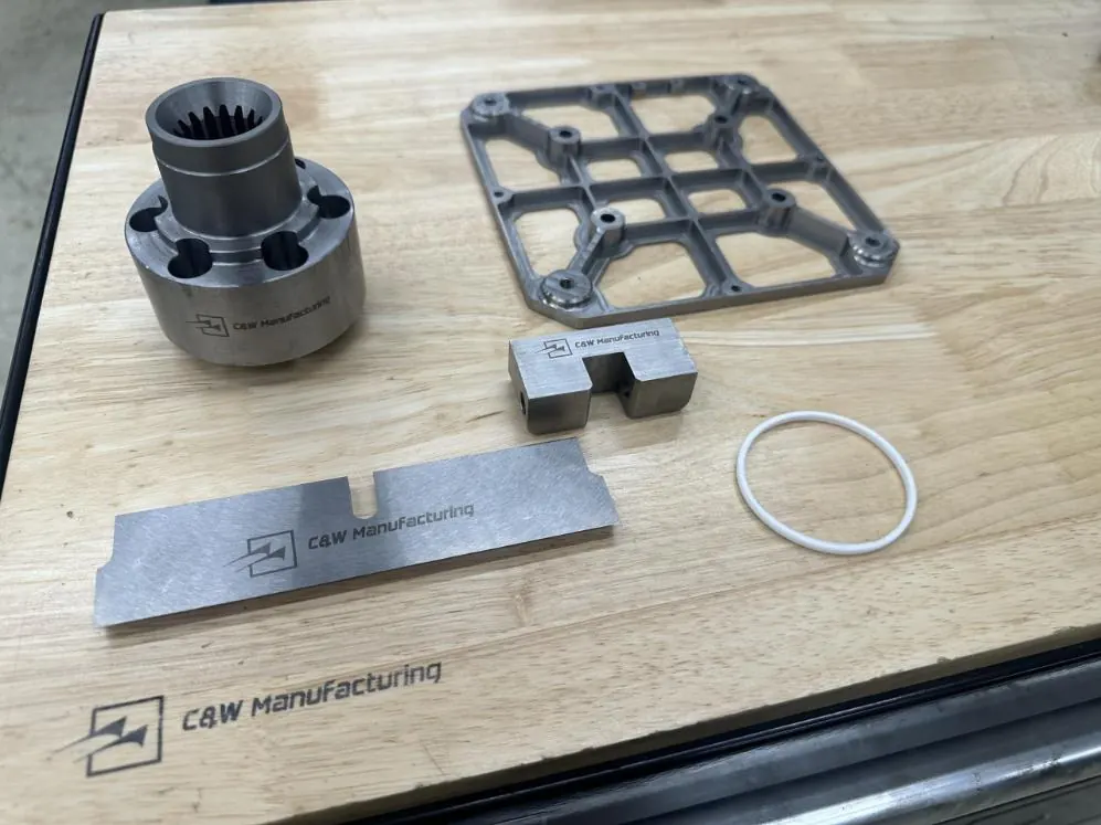 Finished parts laser-marked with the C&W logo